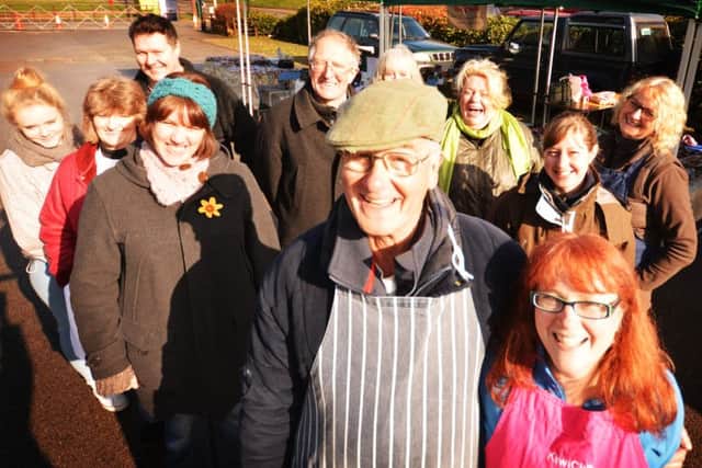 Market manager Johnnie Watherston, centre, with just some of the local producers and sellers at Tring Farmers' Market