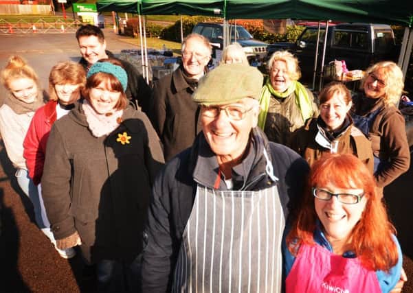 Market manager Johnnie Watherston, centre, with just some of the local producers and sellers at Tring Farmers' Market