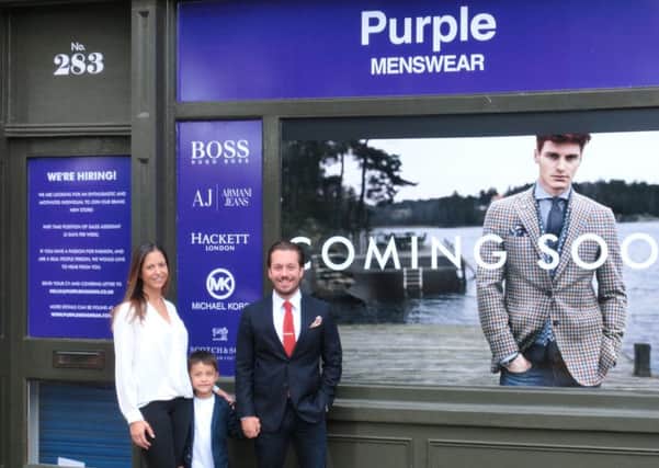 Paul and Lauren Monks with son Preston, six, outside the new shop in Berkhamsted