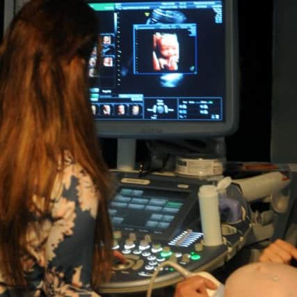 An image taken from a 3D scan of baby in mummy's tum is sent off to a firm to be rendered into 360 degree form and printed in 3D.
Photo: SWNS