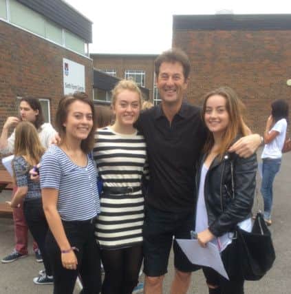 Tring school A Level results assistant head Mr Dobberson with his successful daughters Olivia Martha and Grace