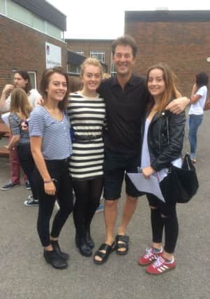Tring school A Level results assistant head Mr Dobberson with his successful daughters Olivia Martha and Grace