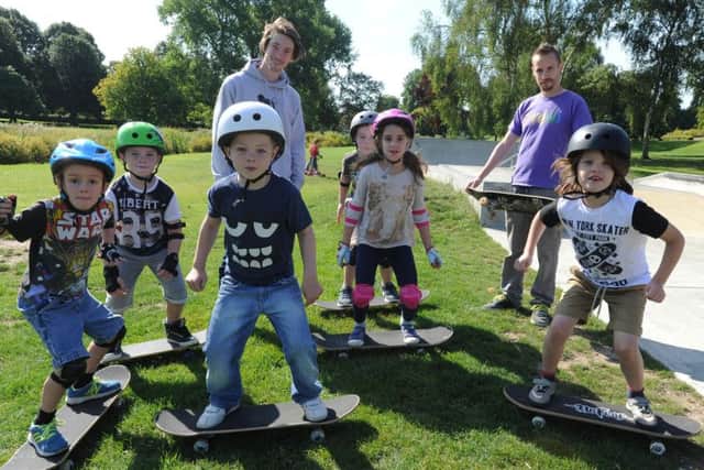 Young skateboarders at Gadebridge Park, Hemel Hempstead with instructors Josh Ward-Brickett, left, and Lee Tickner.