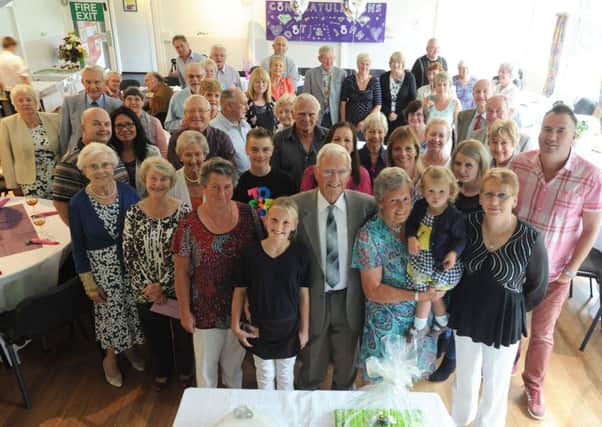 Dot and John Burgin, centre front, celebrated their golden wedding anniversary at Flaunden Village Hall