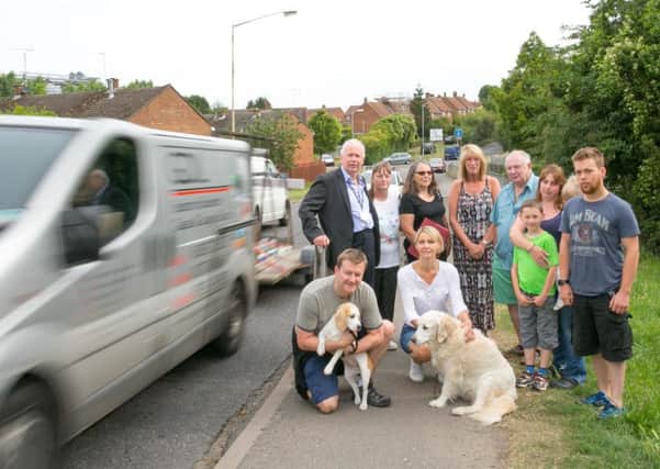 County councillor Nick Hollinghurst with residents of Longbridge Close, who want a zebra crossing installed on Icknield Way to make their childrens' journeys to school safer