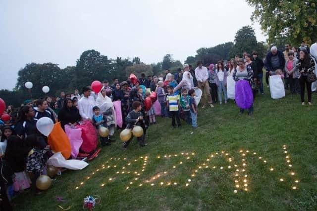 Chinese lanterns and balloons are released and candles lit in memory of popular teenager Fazan Ahmed, from Hemel Hempstead
