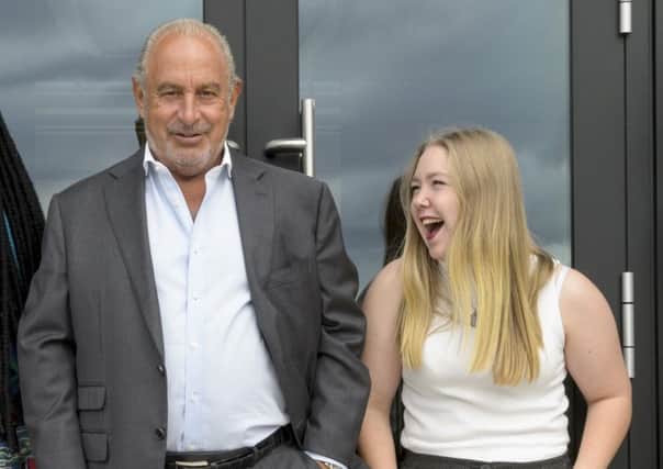 Callie Waters (second right), 19, from Hemel Hempstead, from the Fashion Retail Academy, with Sir Philip Green