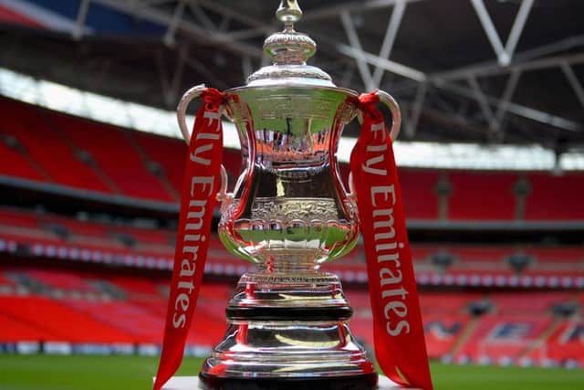The Emirates FA Cup trophy