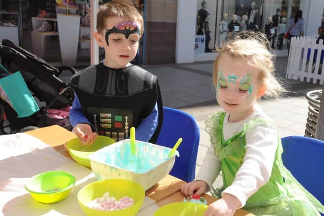 Riverside in Hemel Hempstead is ten years old. Cupcake making with Henry and Alice Morgan aged five and two.
