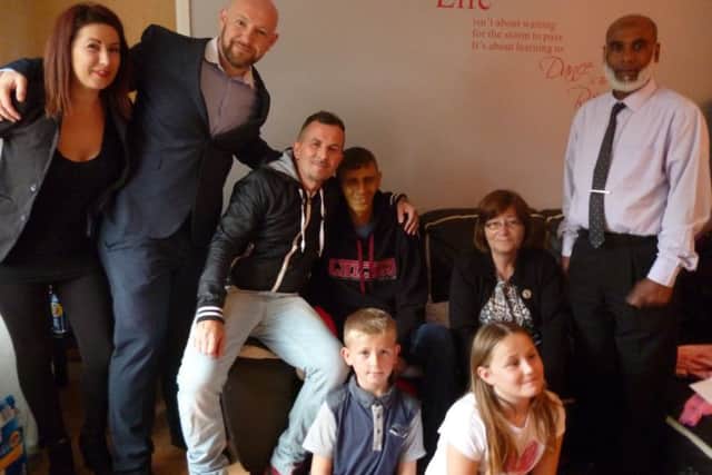 Clockwise from left: Steph Twydell, JB John, Terry Coldwell, Andy Williams, Gill O'Malley, Mama from the Sitar in Boxmoor and Andy's two children, Leah, nine, and Harry, seven