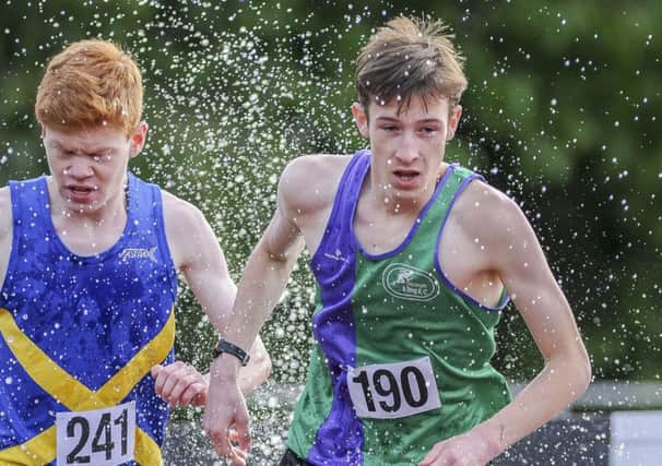Rhys Rowlands, right, set a new steeplechase record this season. Picture (c) Gary Mitchell