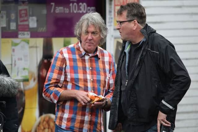 James May tucks into a packet of Walkers' chicken flavour crisps while filming in Hemel Hempstead. Photo: John Baldwin PNL-150922-172144001