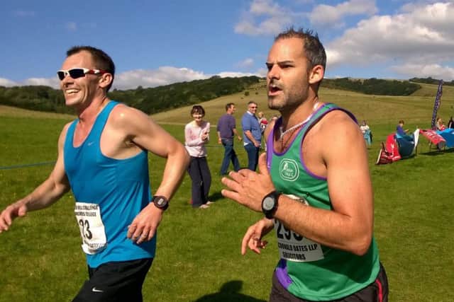 Richard Brawn, right, competing in the Butser Hill challenge