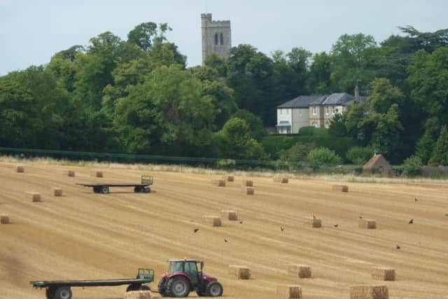 Baling straw in an arable field in the Vale