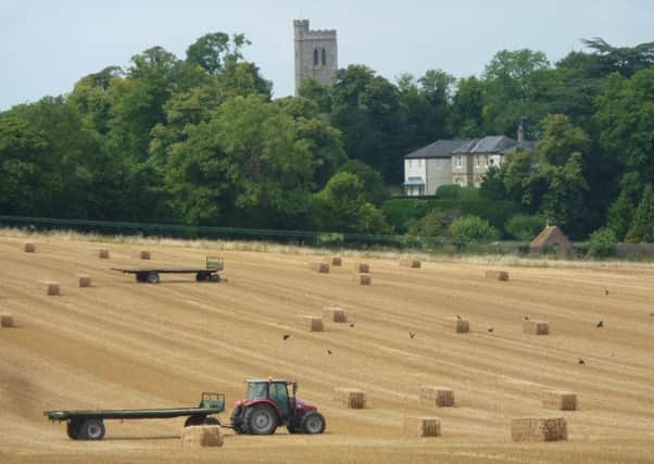 Baling straw in an arable field in the Vale