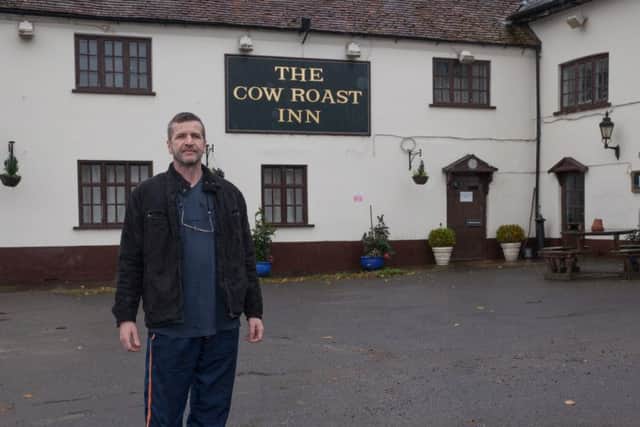 Landlord George Lima outside The Cow Roast Inn