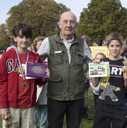 L to R -  Harvey Barnes (Conker Champion 2015), Peter Phillips (Box Moor Trustee), Dev Parry (runner-up).