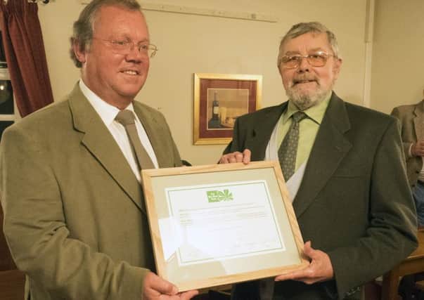 Box Moor Trust chairman David Kirk with Roger Hands.