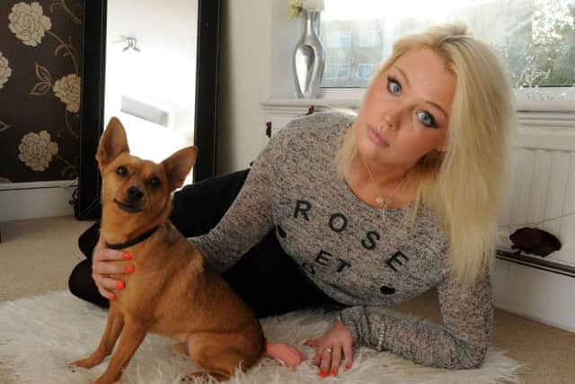 Katie Scott and her dog Teddy, who had part of his tail bitten off in an attack in Berkhamsted.