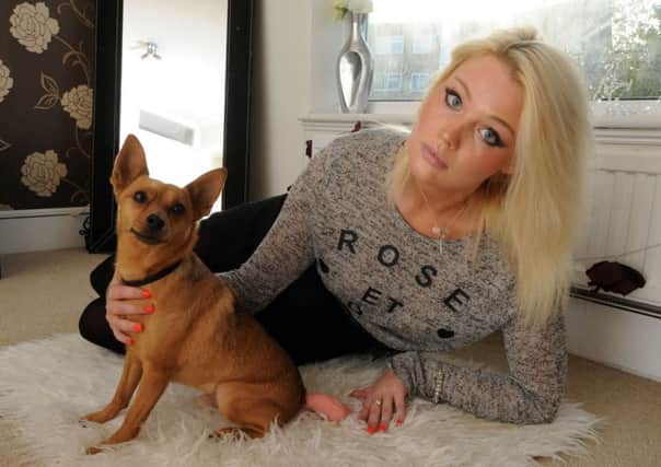 Katie Scott and her dog Teddy, who had part of his tail bitten off in an attack in Berkhamsted.