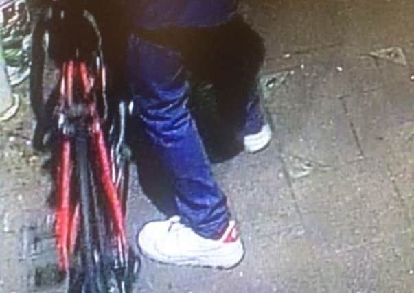 The CCTV image of the bike being stolen from behind Porters restaurant on Berkhamsted High Street