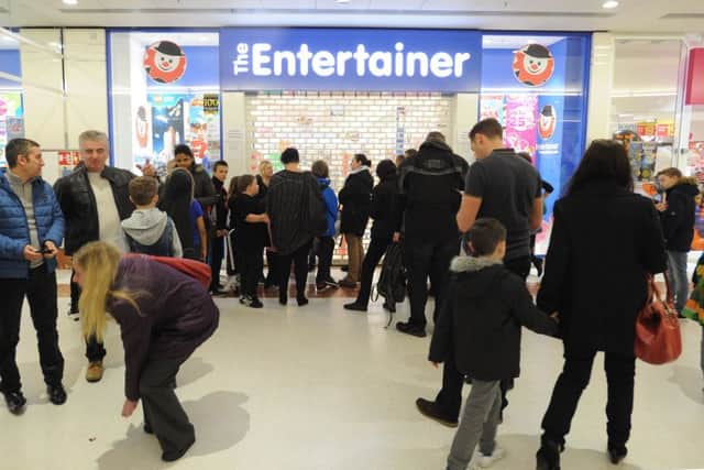 Queue at The Entertainer, Marlowes Centre on Friday morning.
