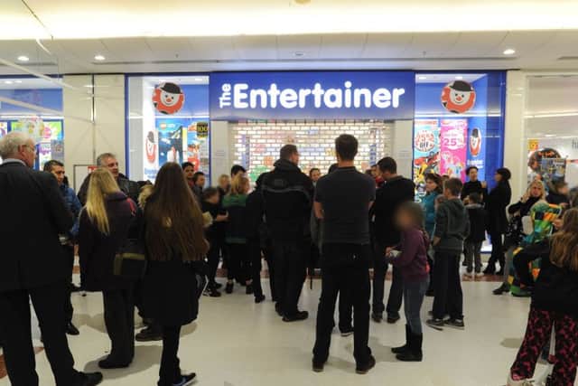 Queue at The Entertainer, Marlowes Centre on Friday morning.