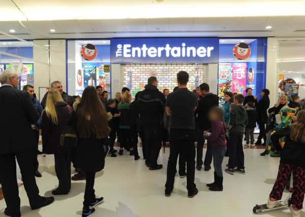 Queue at The Entertainer, Marlowes Centre on Friday morning.
