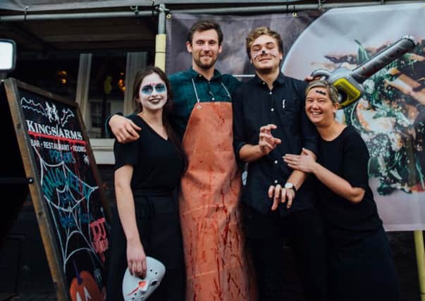 Kings Arms' general manager George Tompkins and some of his team on Halloween night before they closed for the week.