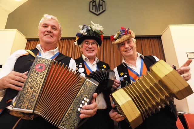 Aldbury Morris men rehearse at the Memorial Hall, Aldbury, on Thursday evening.
Three of the musicians,from left,  Roger Dorman, Terry Cartmell and Peter Dunton