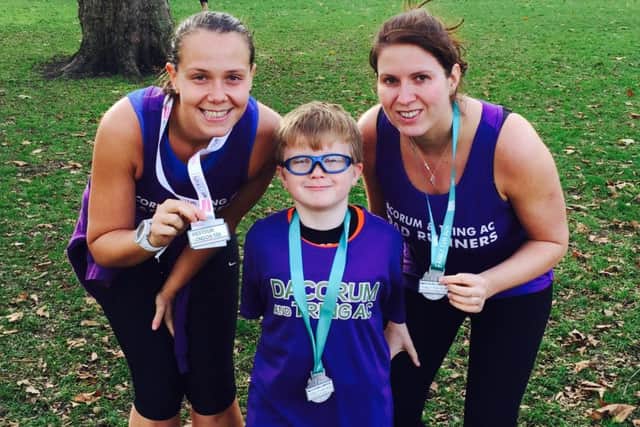 Clare Hunt and Kayleigh Halvey with Kayleigh's nephew Reilly at the Vitality WestRun London race