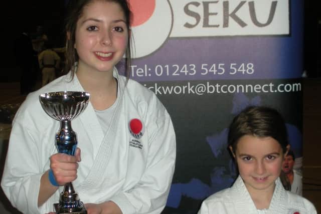 SSKI's Cristy Nash, left, and Crystal Close showed their fighting spirit at the Portsmouth Open Karate Championships