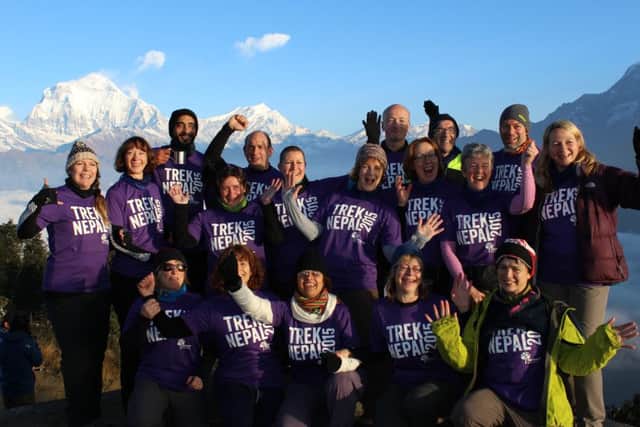 'We made it!' The intrepid trekkers just after sunrise at the top of Poon Hill.