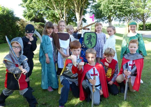 Year 2 pupils at Grove Road Primary School in Tring celebrate Charter 700 in their best medieval garb