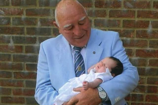 Geoff Dell with his youngest granddaughter Emily as a baby