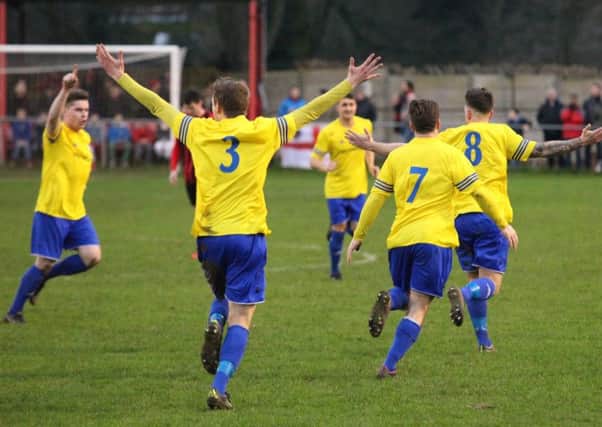 Number 8 Steve Hawes celebrates scoring his goal. Picture (c) Ray Canham