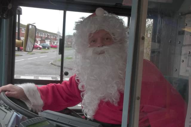Arriva bus driver Ian Evans, who is dressing up as Father Christmas to raise money for charity
