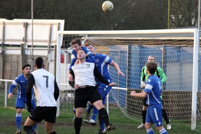 Bradley O'Donovan challenges for the ball. Picture (c) Ray Canham