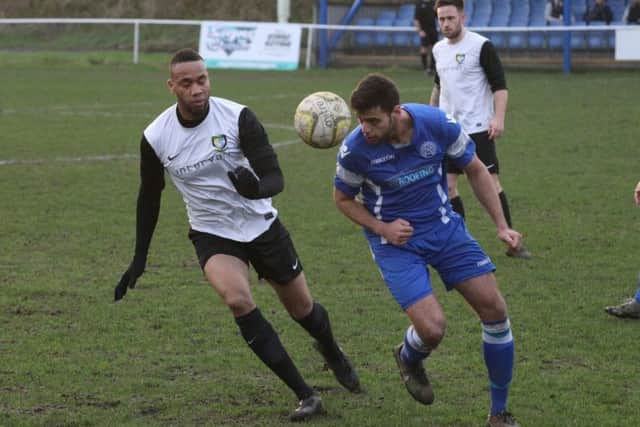 Jude Eboji is beaten to the ball. Picture (c) Ray Canham