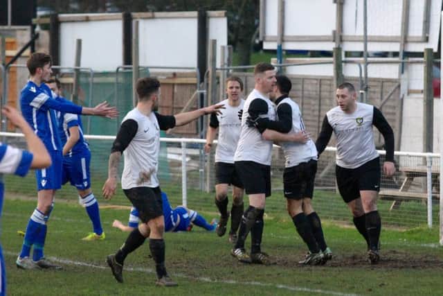 Alex Campana is congratulated after scoring his goal. Picture (c) Ray Canham