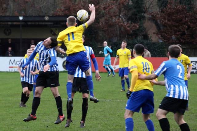 Number 11 Josh Chamberlain challenges for the ball for Berkhamsted. Picture (c) Ray Canham