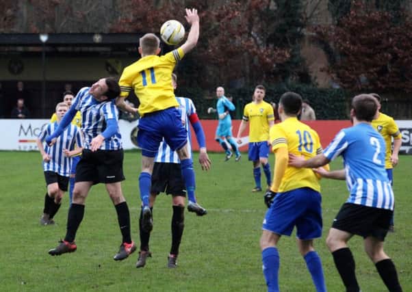 Number 11 Josh Chamberlain challenges for the ball for Berkhamsted. Picture (c) Ray Canham