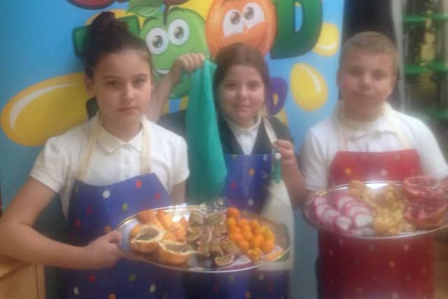 Children attending the Good Food Club cookery school