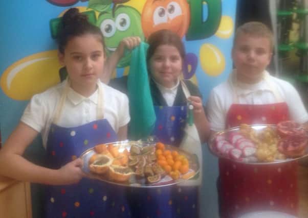 Children attending the Good Food Club cookery school