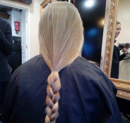 Shannel Gomm, 11, had 13 inches of her hair cut off for the Little Princess Trust