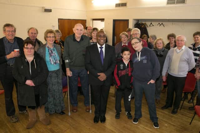 Dr Tony Hall-Jones, centre, with just some of the patients he has treated over the years