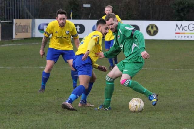 Adiel Mannion battles for the ball for Berkhamsted. Picture (c) Ray Canham
