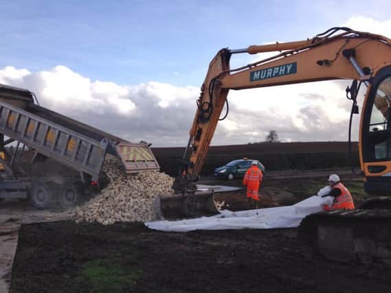 Lorry load of railway foundation stone delivered to the site