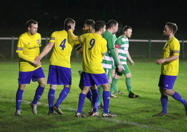James Baldry gets the congratulations after netting the opener against Holmer Green last night. Picture (c) Ray Canham