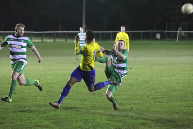 Adiel Mannion takes on the Holmer Green defence. Picture (c) Ray Canham